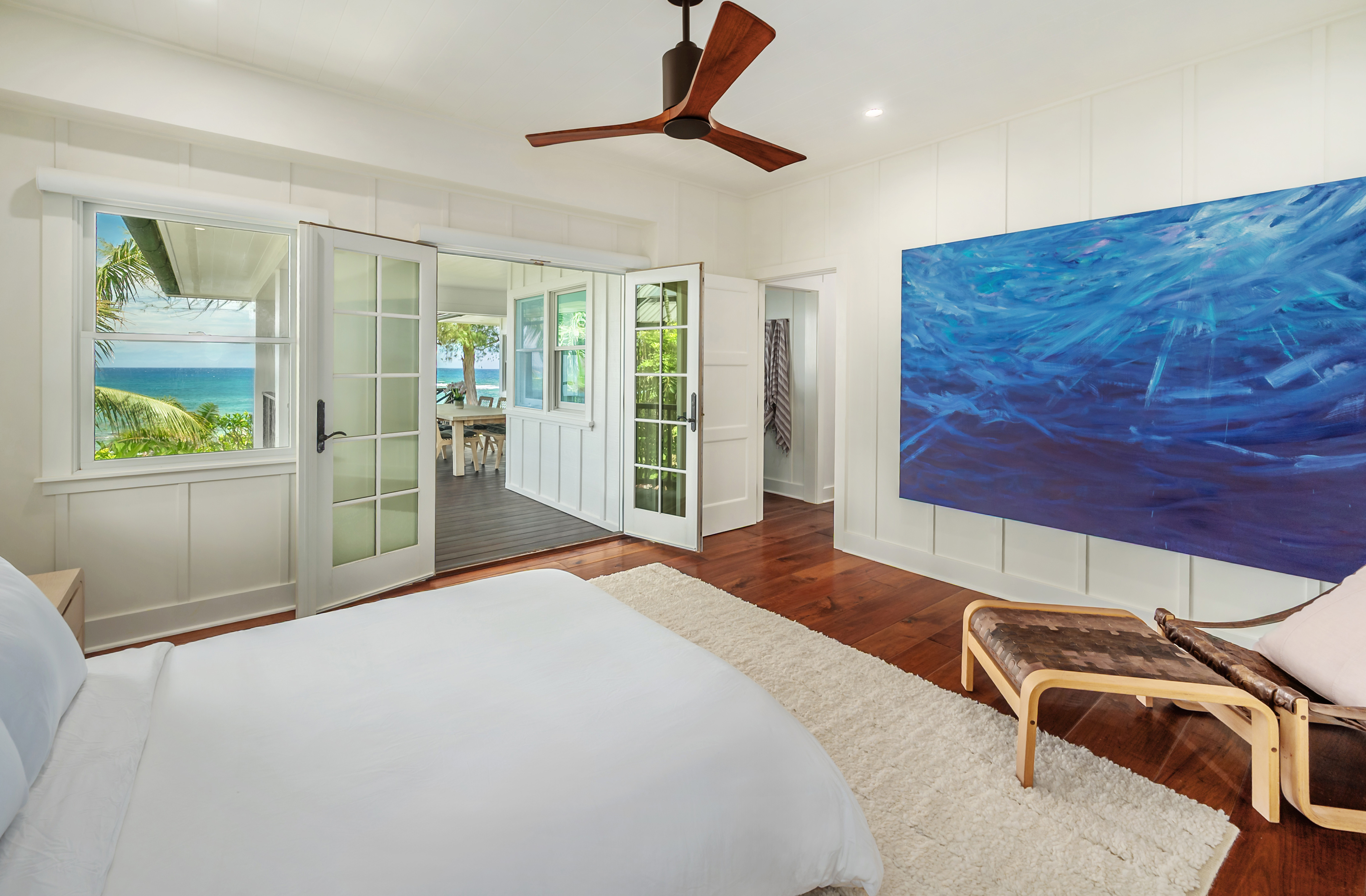 7336 Alealea Road Hanalei, HI 96714 - Photo 20 of 30 a bedroom with furniture and a window