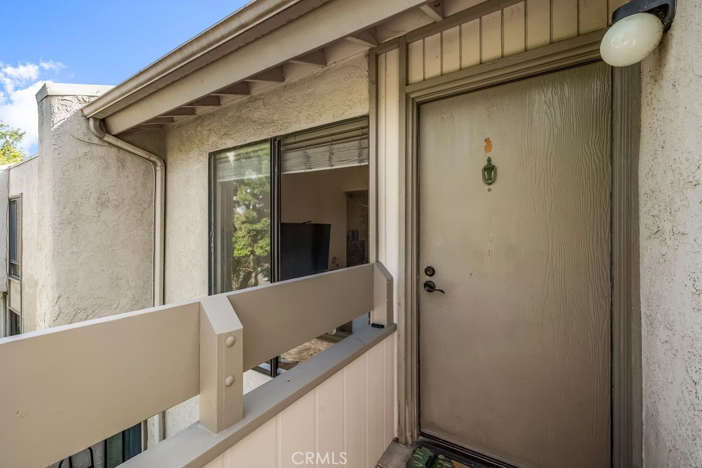 3000 Associated Road, Unit 58 Fullerton, CA 92835 - Photo 2 of 35 UPSTAIRS CONDO FRONT DOOR