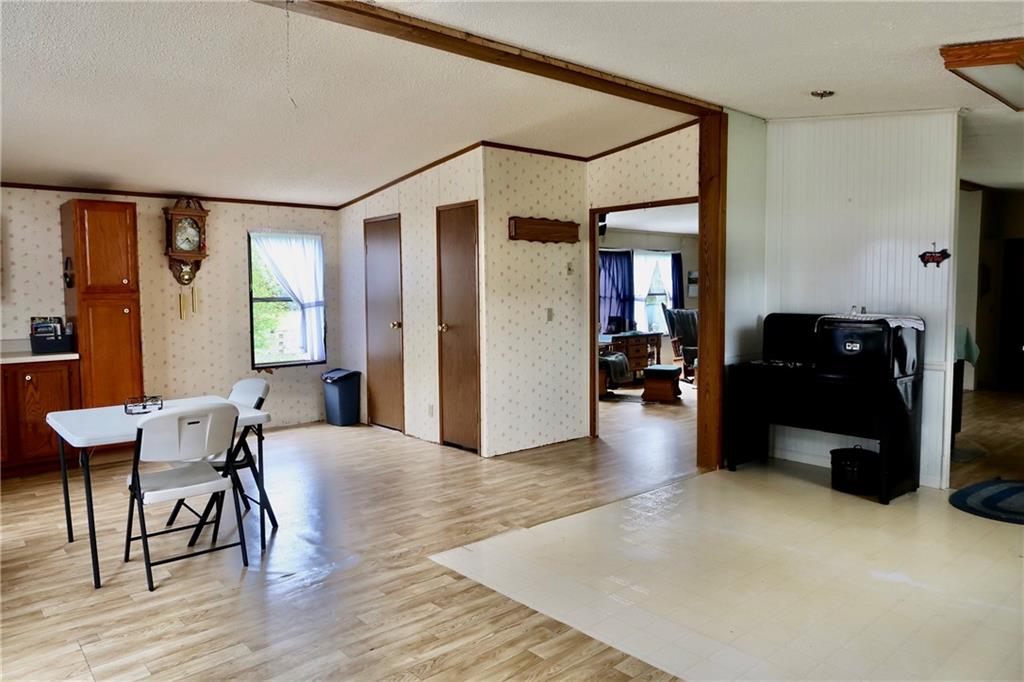 78 Balut Road Fredonia, PA 16124 - Photo 15 of 29 a living room with furniture and a wooden floor