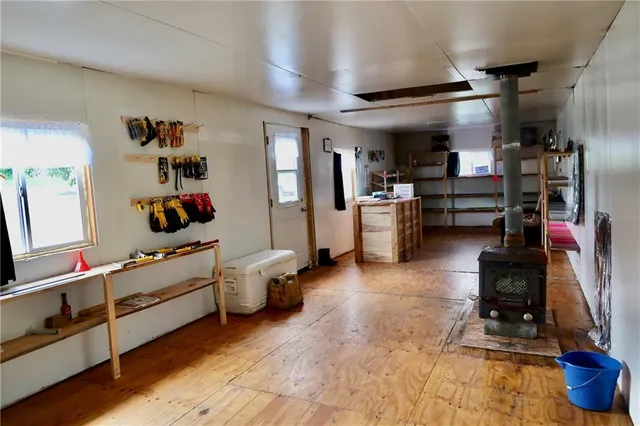 a room with gym equipment and appliances