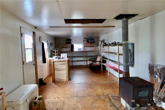 a room with furniture and a flat screen tv