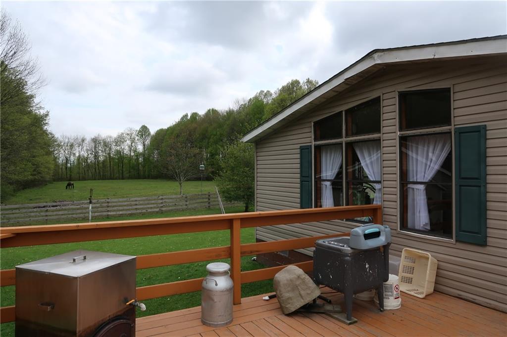 78 Balut Road Fredonia, PA 16124 - Photo 3 of 29 a backyard of a house with wooden floor and outdoor seating