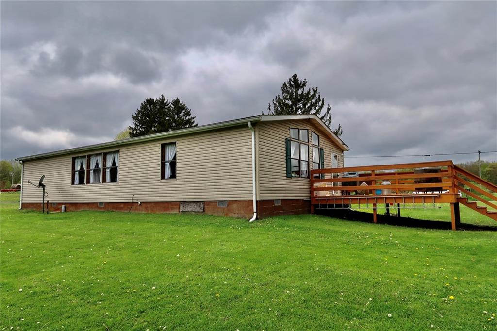 78 Balut Road Fredonia, PA 16124 - Photo 9 of 29 a backyard of a house with table and chairs