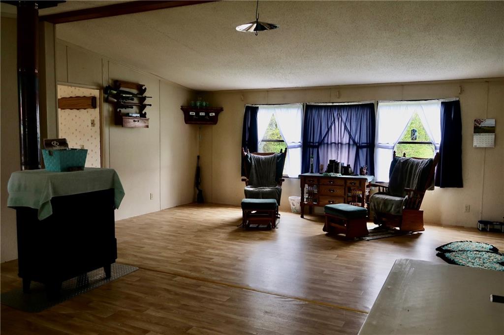 78 Balut Road Fredonia, PA 16124 - Photo 10 of 29 a view of a livingroom with workspace and a window
