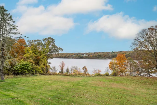 a view of a lake from a yard