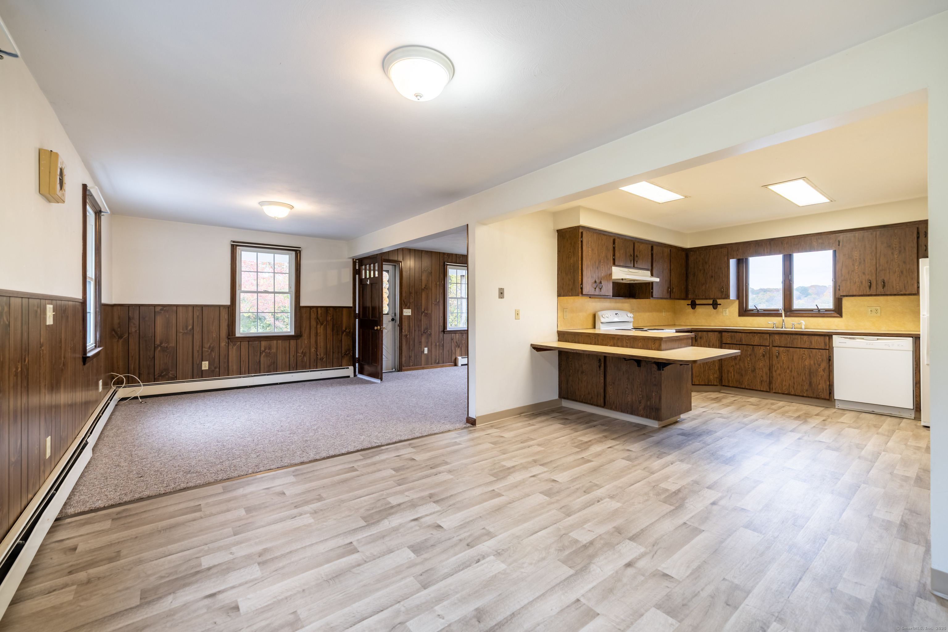 23 Waldo Road Norwich, CT 06360 - Photo 3 of 26 a large kitchen with a center island and counter space