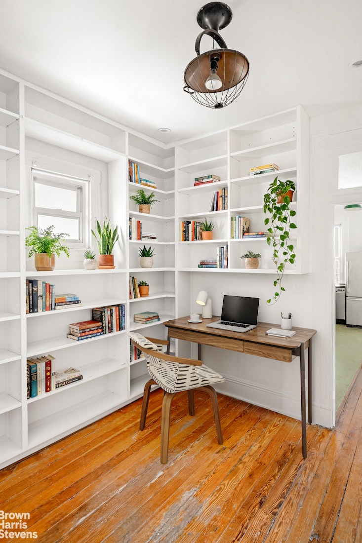 100 Newel Street, Unit 4L Brooklyn, NY 11222 - Photo 5 of 13 a living room with furniture and a wooden floor