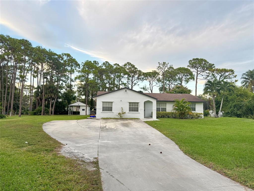 a view of outdoor space yard and front view of a house