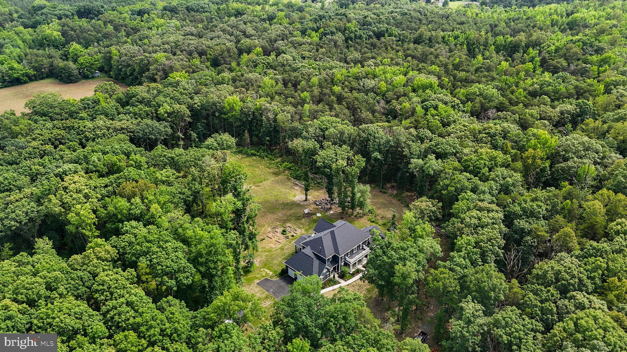 80 Shackelford Well Road Fredericksburg, VA 22406 - Photo 89 of 108 an aerial view of a house with a yard