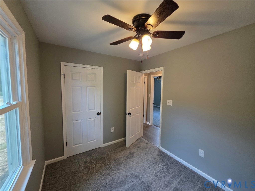 7613 Squirrel Level Road Petersburg, VA 23805 - Photo 30 of 30 Neutral wall color, ceiling fan with integrated li