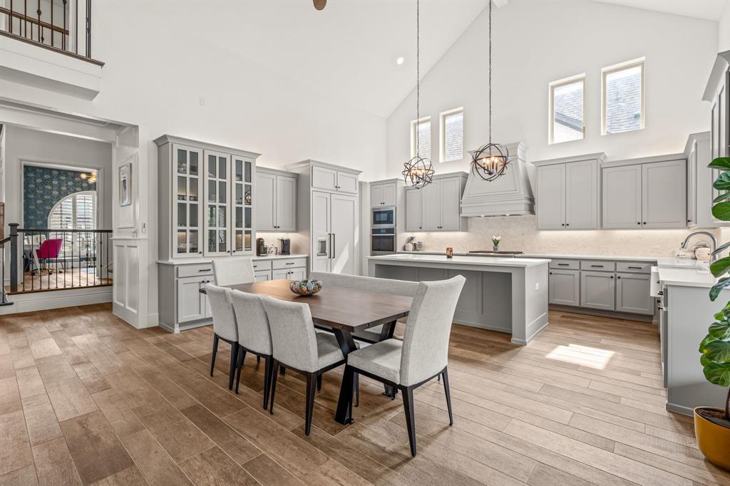 1616 Prairie Ridge Road Fort Worth, TX 76008 - Photo 5 of 40 a large kitchen with a table and chairs