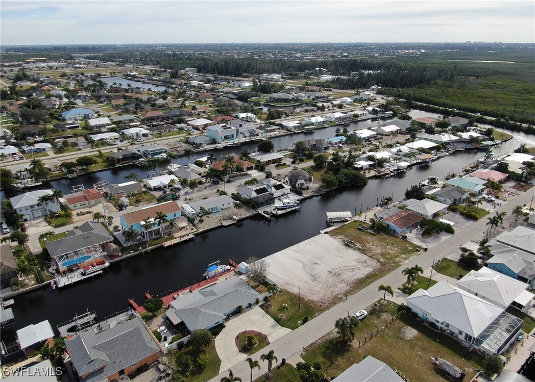 12262 Moon Shell Drive Matlacha Isles, FL 33991 - Photo 3 of 11 an aerial view of a city with lots of residential buildings