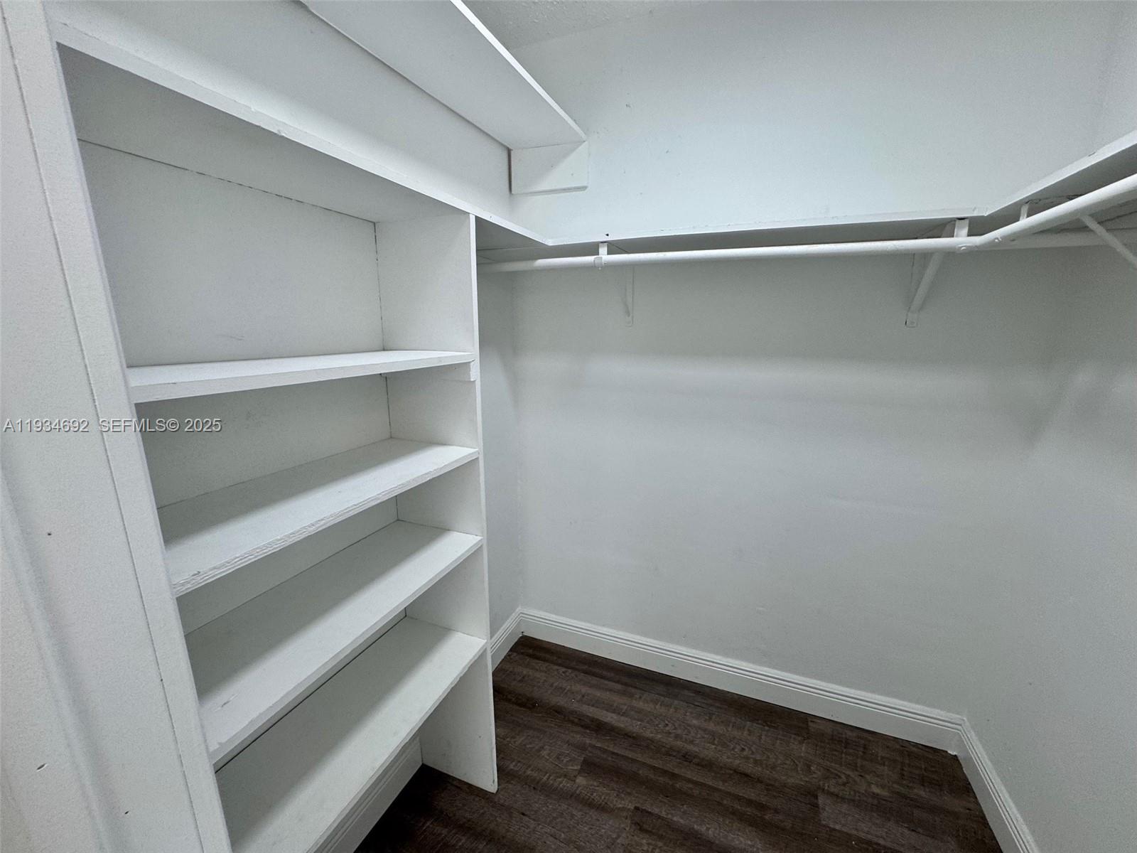 100 Southwest 9th Street, Unit B Hallandale Beach, FL 33009 - Photo 11 of 17 a view of an empty walk in closet