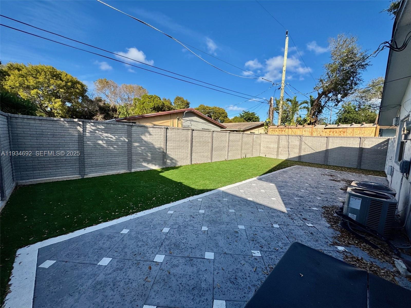 100 Southwest 9th Street, Unit B Hallandale Beach, FL 33009 - Photo 17 of 17 a view of a back yard