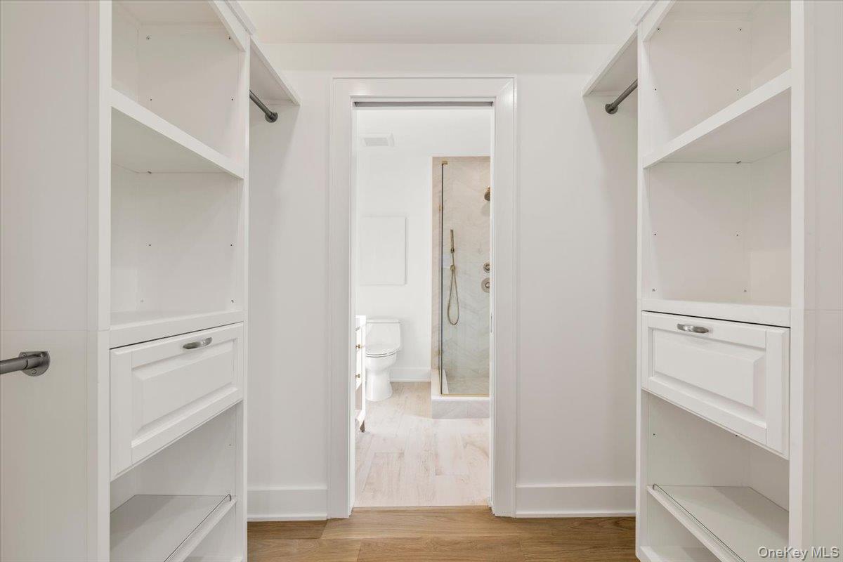 60 Grapal Street Rye, NY 10580 - Photo 11 of 36 a view of walk in closet with empty racks
