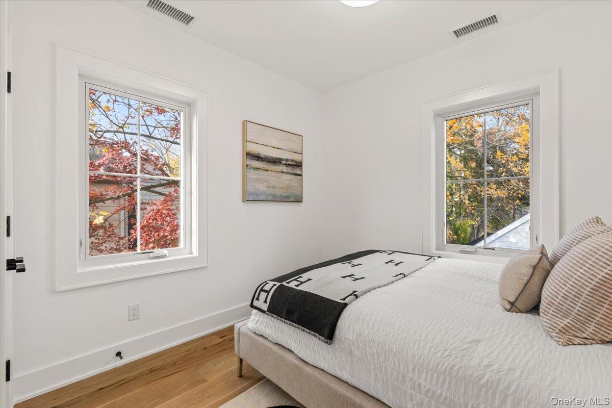 60 Grapal Street Rye, NY 10580 - Photo 15 of 36 a bedroom with a bed and a window