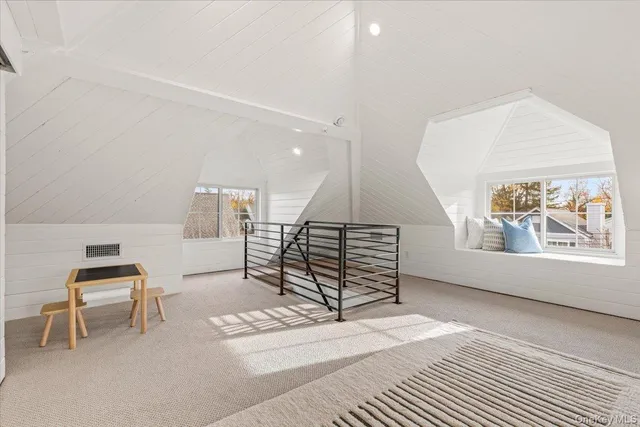 a view of entryway with stairs and furniture