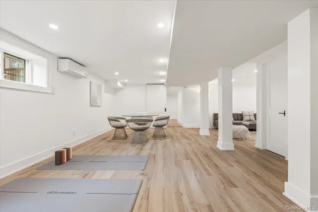 a view of a dining area with furniture and wooden floor