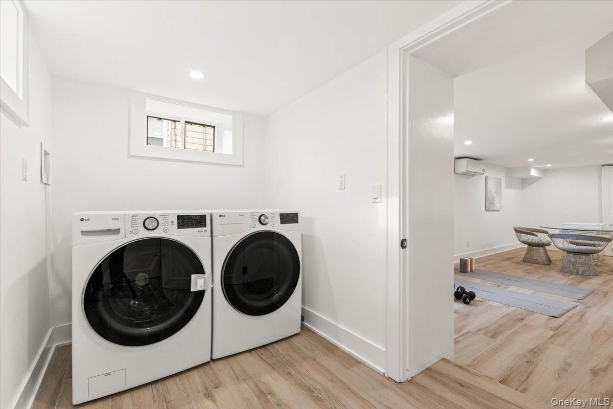 60 Grapal Street Rye, NY 10580 - Photo 21 of 36 a view of a hallway with washer and dryer