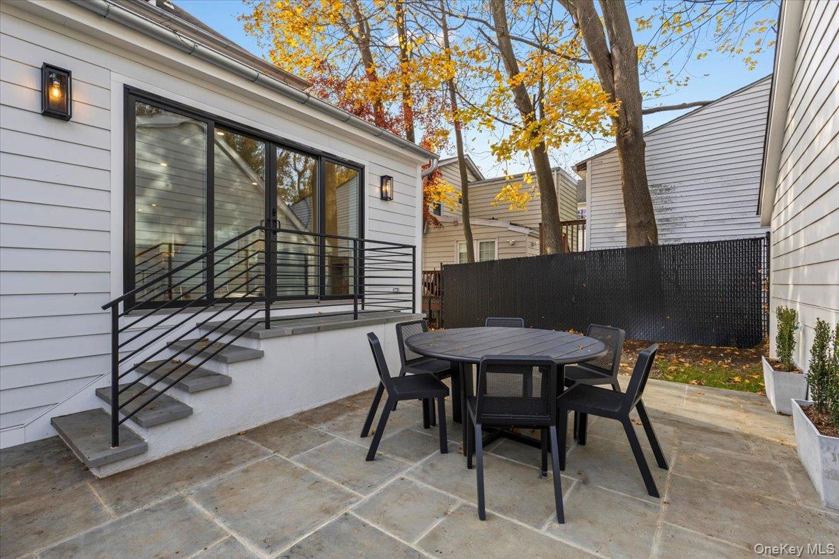 60 Grapal Street Rye, NY 10580 - Photo 23 of 36 a view of a chairs and table in the balcony
