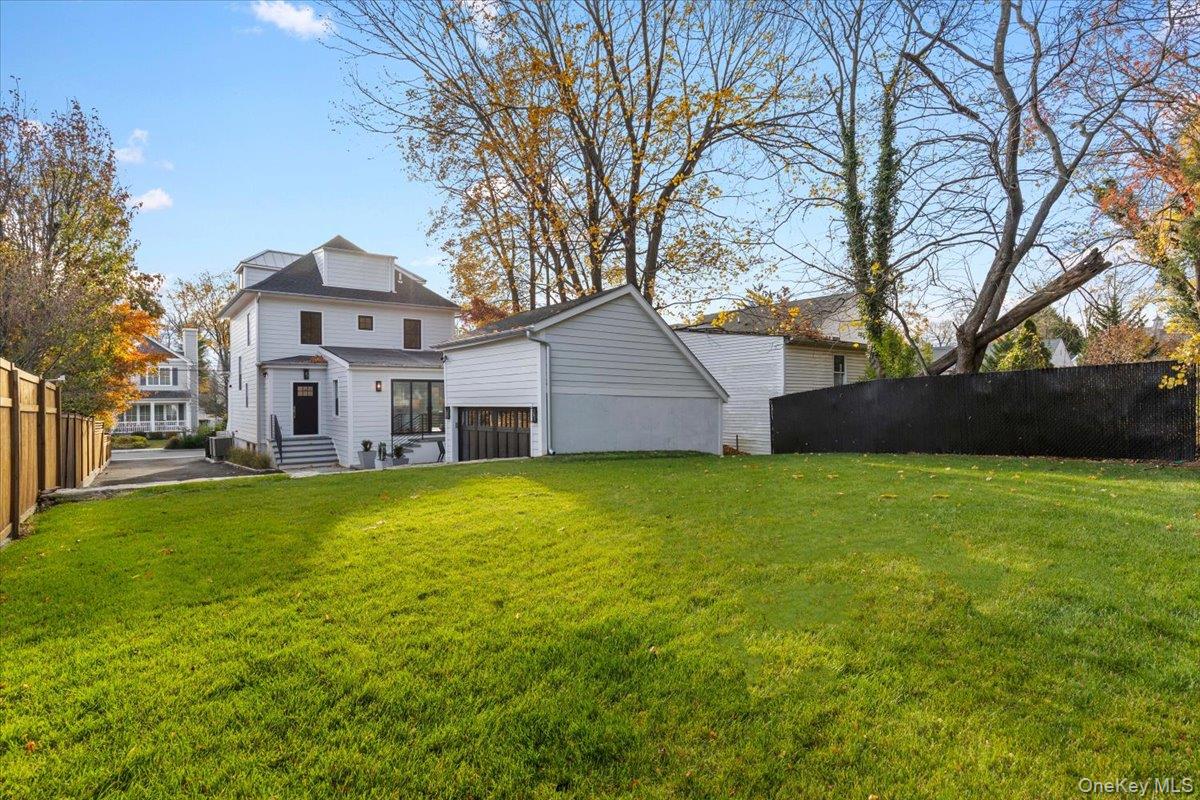 60 Grapal Street Rye, NY 10580 - Photo 24 of 36 a front view of a house with garden