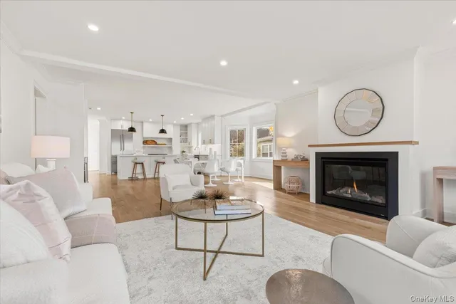 a large kitchen with a table and chairs