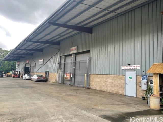 94-133 Pahu Street, Unit A Waipahu, HI 96797 - Photo 2 of 8 a view of a parking garage