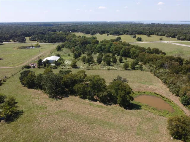 an aerial view of mountains and trees