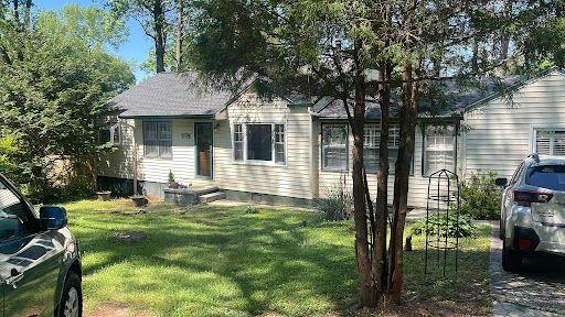 959 Forrest Boulevard Decatur, GA 30030 - Photo 1 of 1 a front view of a house with a garden