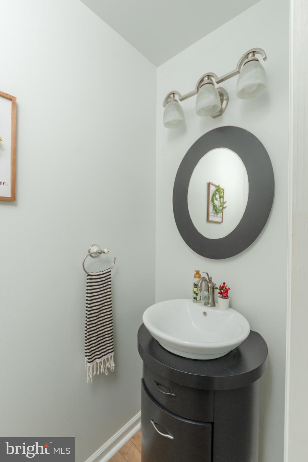 1553 White Oak Road Strasburg, PA 17579 - Photo 13 of 52 a bathroom with a sink and a mirror