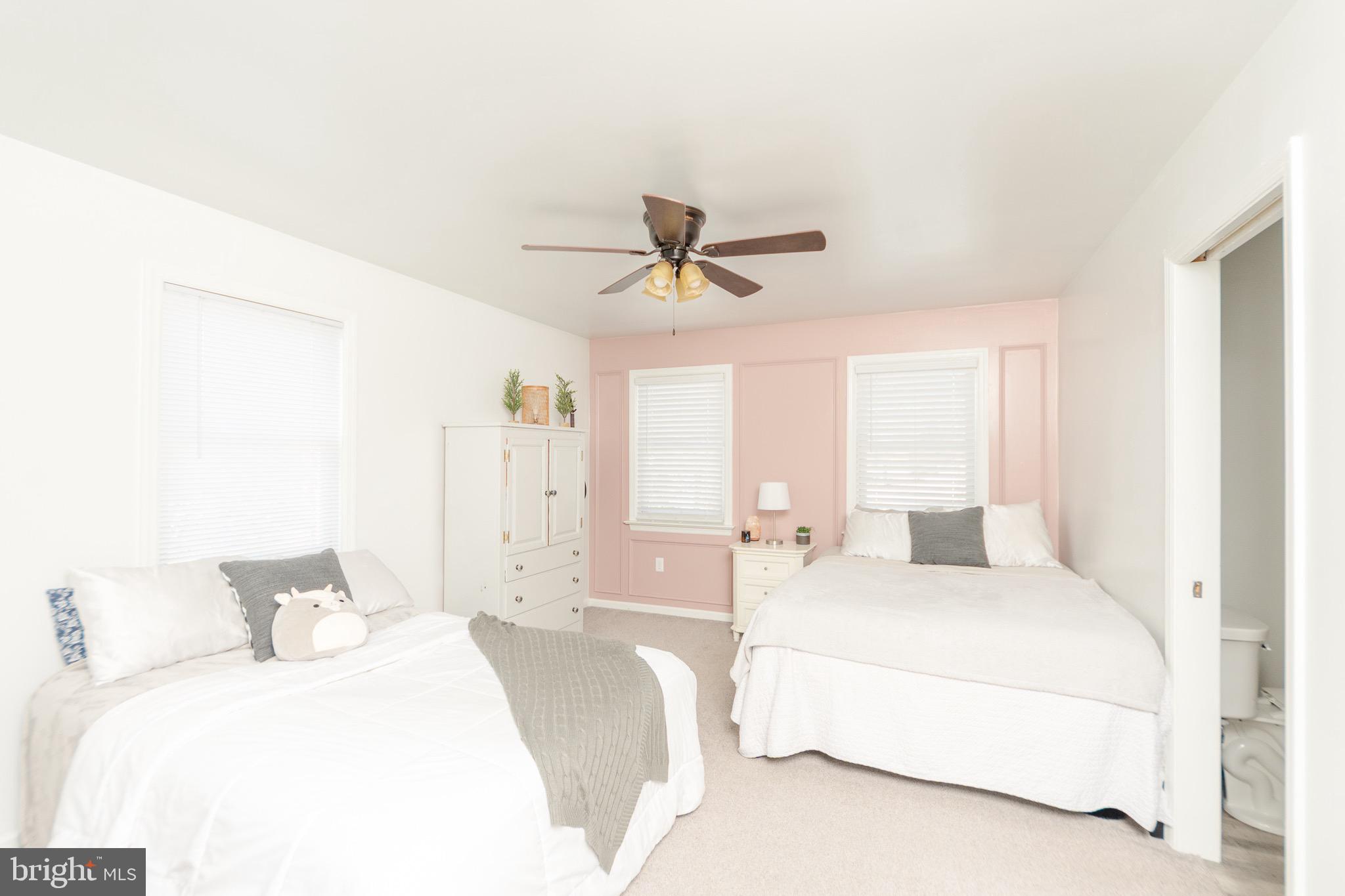 1553 White Oak Road Strasburg, PA 17579 - Photo 24 of 52 a spacious bedroom with a bed and window