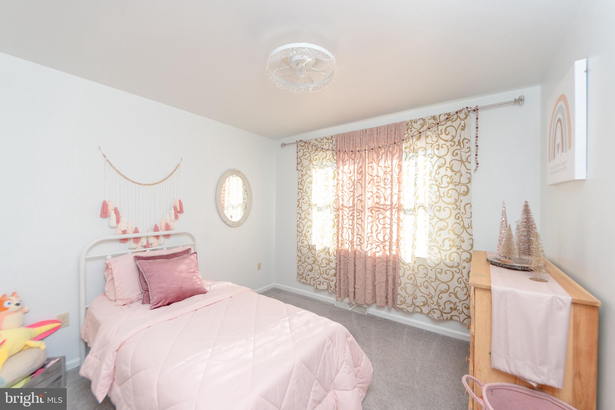 1553 White Oak Road Strasburg, PA 17579 - Photo 29 of 52 a bedroom with a bed and a window