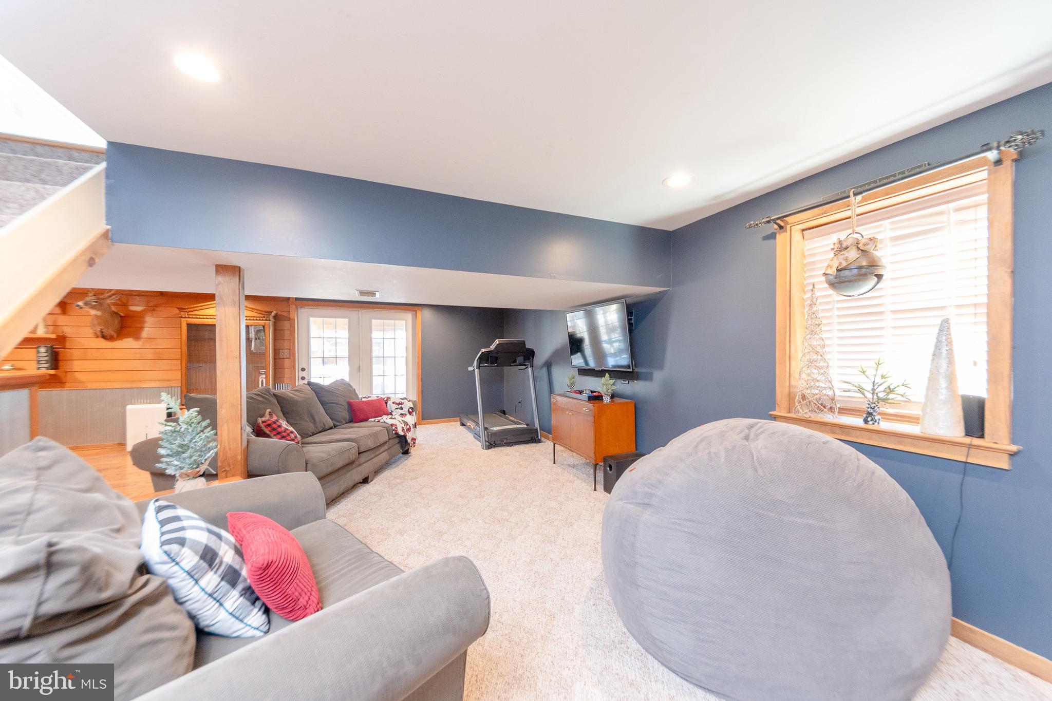 1553 White Oak Road Strasburg, PA 17579 - Photo 33 of 52 a living room with furniture and a large window