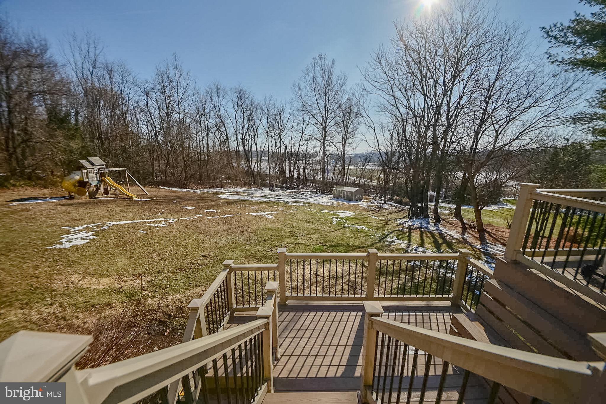 1553 White Oak Road Strasburg, PA 17579 - Photo 41 of 52 a view of a balcony with floor to ceiling window and wooden fence