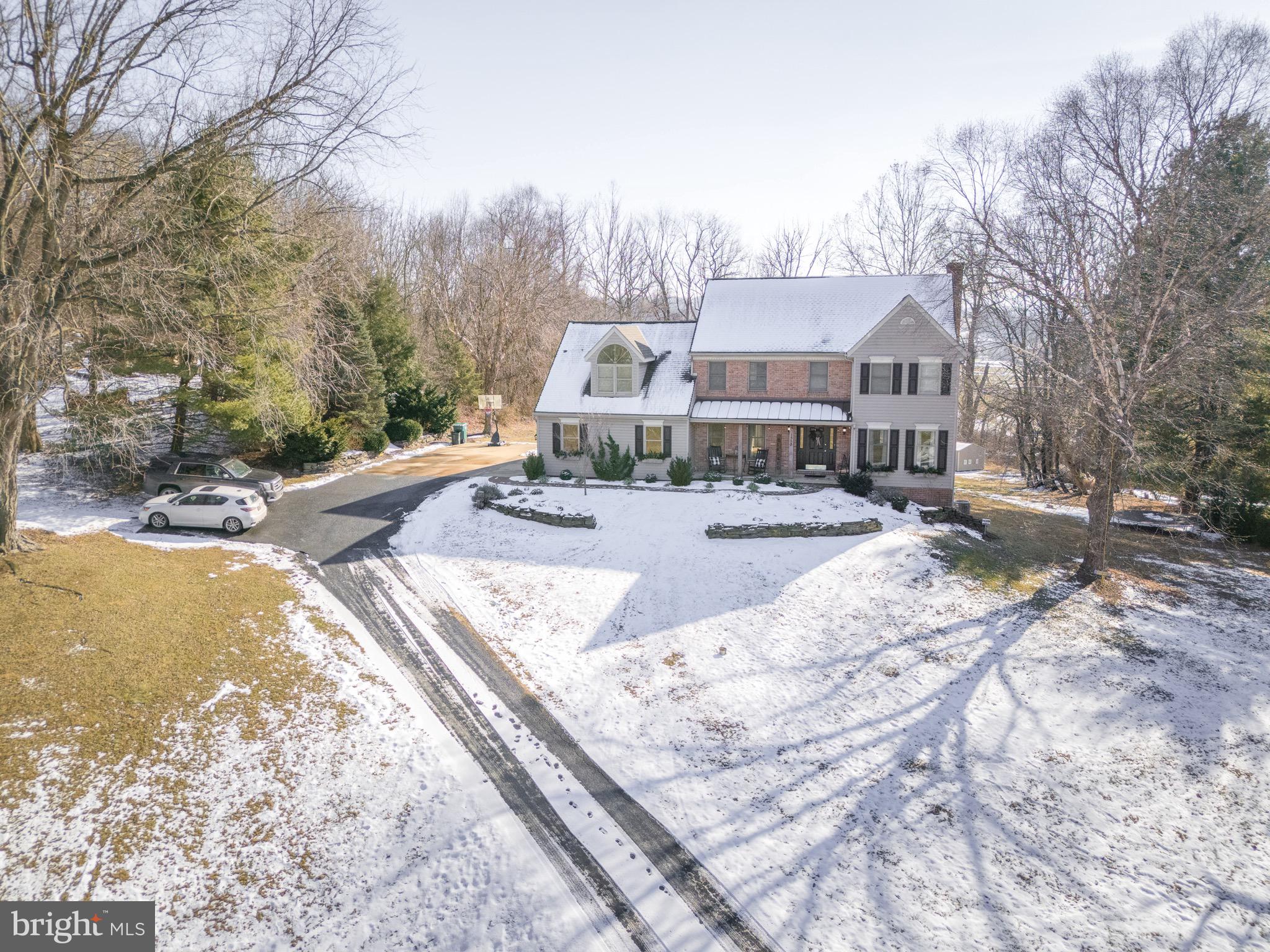 1553 White Oak Road Strasburg, PA 17579 - Photo 43 of 52 a view of a house with pool and trees in the background