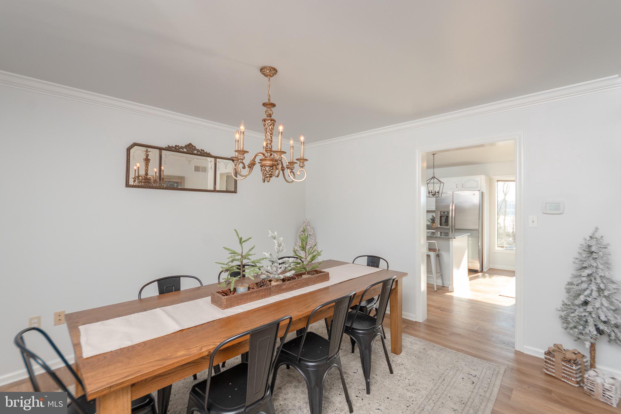 1553 White Oak Road Strasburg, PA 17579 - Photo 7 of 52 a view of a dining room with furniture and wooden floor