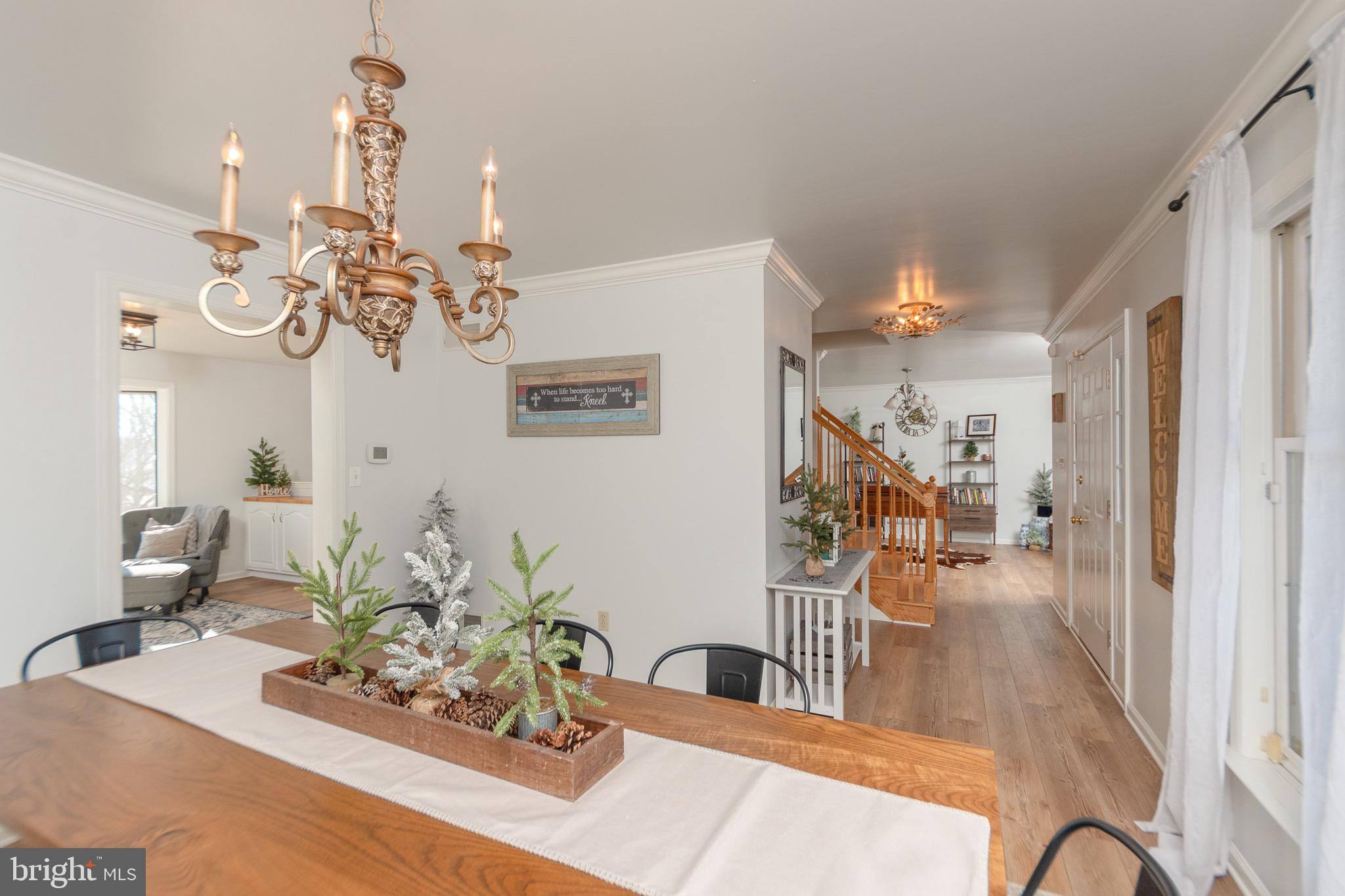 1553 White Oak Road Strasburg, PA 17579 - Photo 8 of 52 a view of a livingroom with furniture and a chandelier