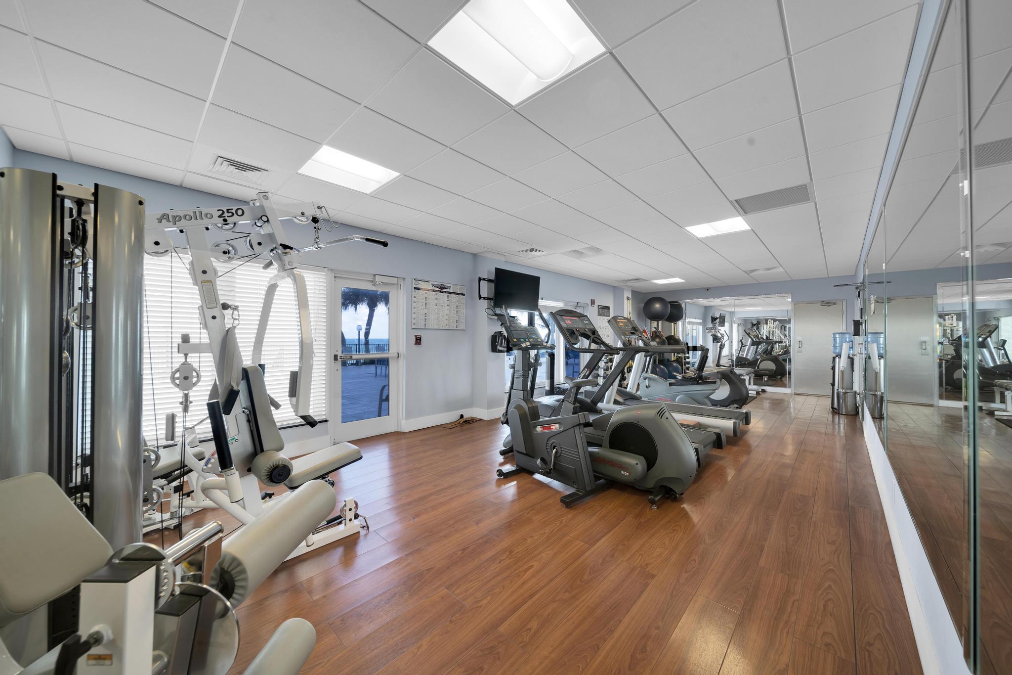 2066 North Ocean Boulevard, Unit 12NE Boca Raton, FL 33431 - Photo 47 of 53 a view of a room with gym equipment