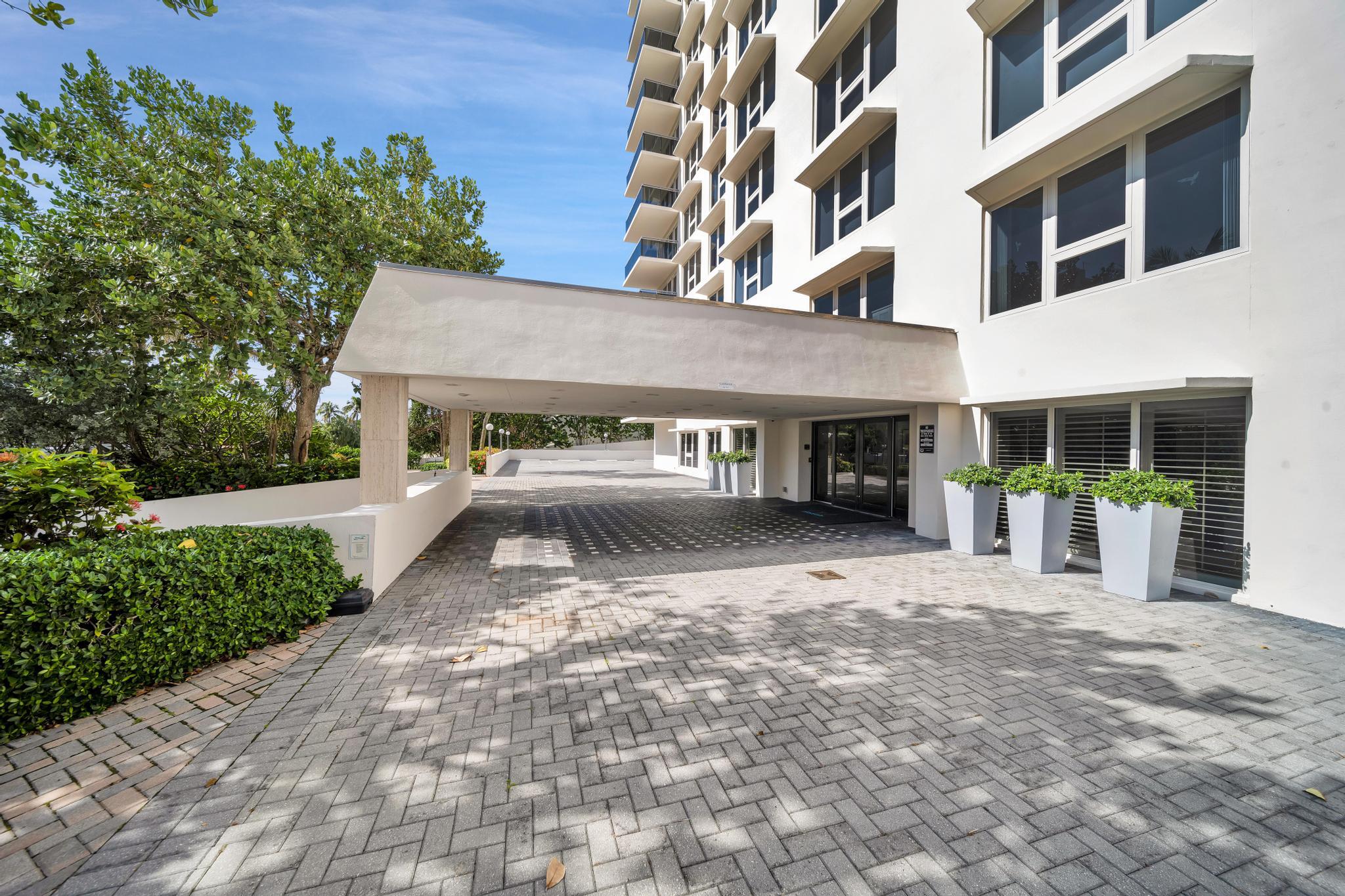 2066 North Ocean Boulevard, Unit 12NE Boca Raton, FL 33431 - Photo 49 of 53 a view of a car park in front of a building