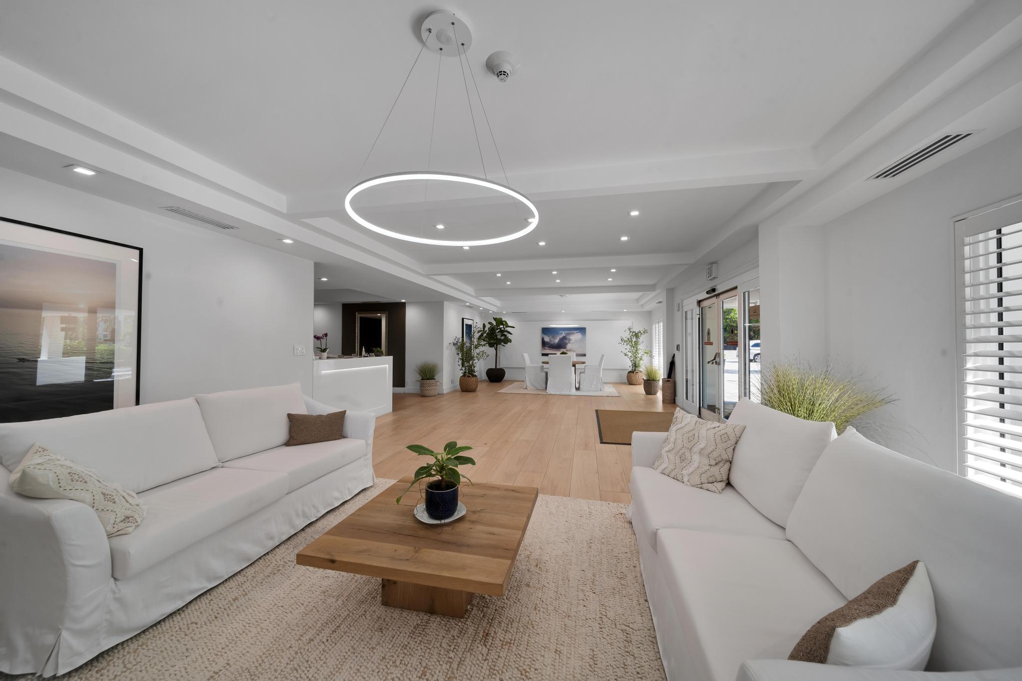 2066 North Ocean Boulevard, Unit 12NE Boca Raton, FL 33431 - Photo 53 of 53 a living room with furniture and a rug
