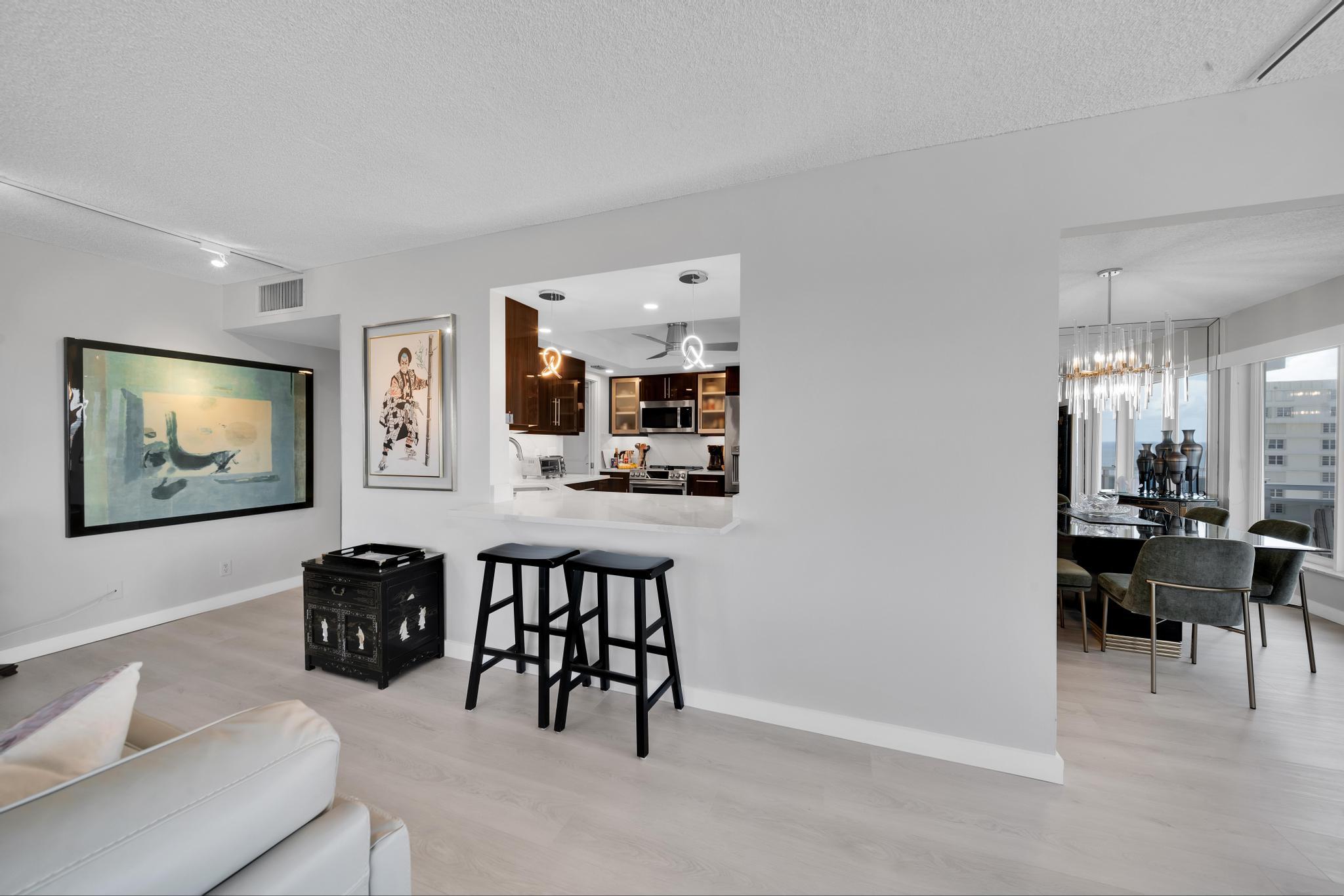 2066 North Ocean Boulevard, Unit 12NE Boca Raton, FL 33431 - Photo 9 of 53 a view of a livingroom with furniture