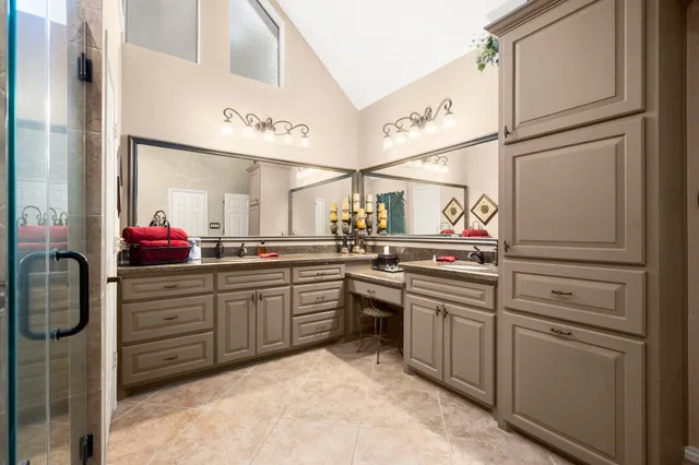 a kitchen with cabinets and appliances