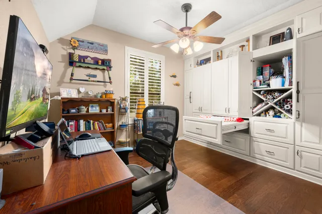 a bathroom with a granite countertop sink toilet tub and shower
