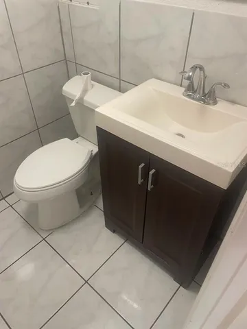 a bathroom with a sink and a toilet