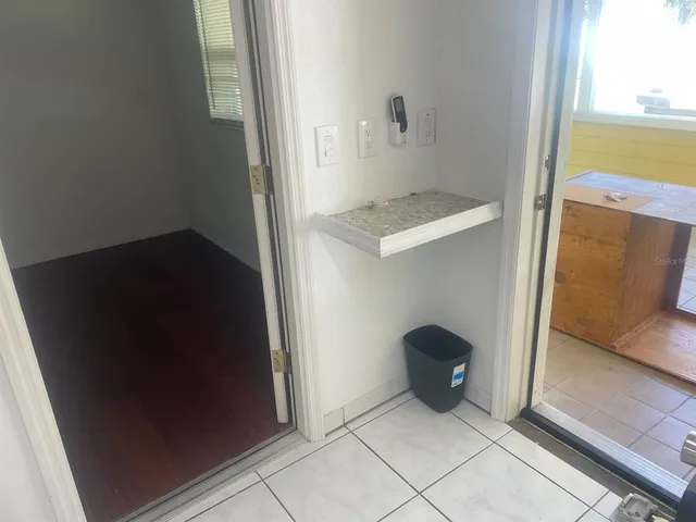 a view of cabinet and utility room