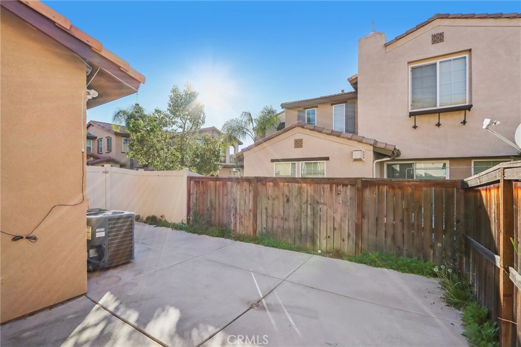 3374 Wind Chime Lane Perris, CA 92571 - Photo 21 of 30 a view of a back yard of the house