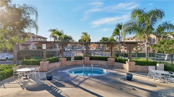 a view of a patio with swimming pool