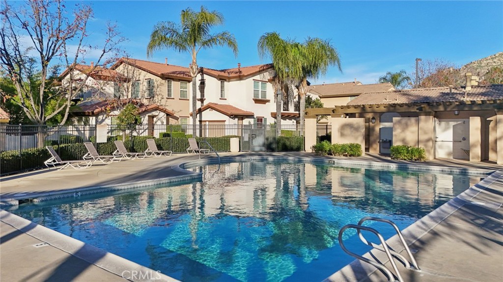 3374 Wind Chime Lane Perris, CA 92571 - Photo 25 of 30 a view of a swimming pool with a patio