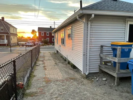 a view of a lake with houses in the back
