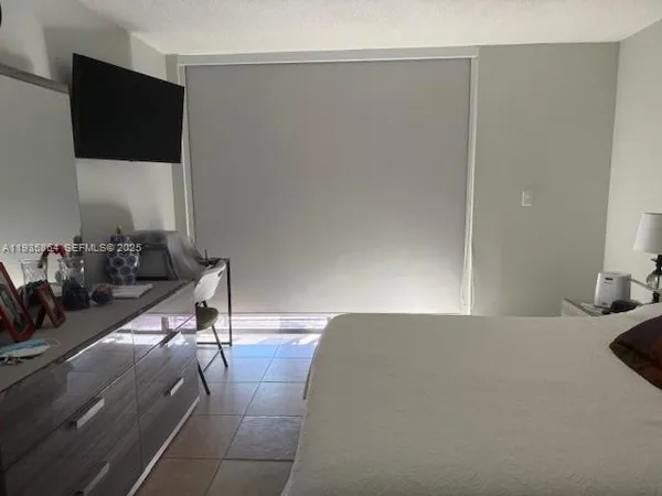 a living room with couches and a coffee table
